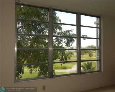 Spacious 2-Bed, 2-Bath Condo with Golf Course Views. Enjoy on Palm-Aire Country Club and Resort - Palms in Florida - for sale on GolfHomes.com, golf home, golf lot