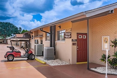 This home is situated in a quiet neighborhood in Sun City Center on Caloosa Greens Executive Golf Course in Florida - for sale on GolfHomes.com, golf home, golf lot
