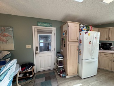 If you are looking for the perfect sanctuary in Central Florida on Lake Henry Golf Club in Florida - for sale on GolfHomes.com, golf home, golf lot