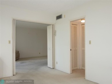 Spacious 2-Bed, 2-Bath Condo with Golf Course Views. Enjoy on Palm-Aire Country Club and Resort - Palms in Florida - for sale on GolfHomes.com, golf home, golf lot