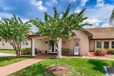 This home is situated in a quiet neighborhood in Sun City Center on Caloosa Greens Executive Golf Course in Florida - for sale on GolfHomes.com, golf home, golf lot