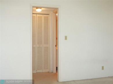 Spacious 2-Bed, 2-Bath Condo with Golf Course Views. Enjoy on Palm-Aire Country Club and Resort - Palms in Florida - for sale on GolfHomes.com, golf home, golf lot