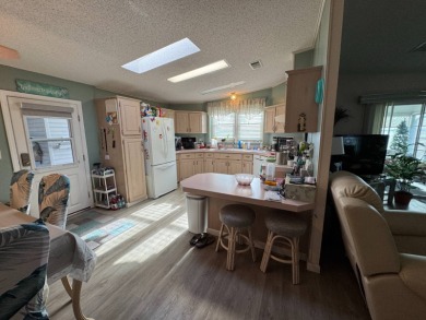 If you are looking for the perfect sanctuary in Central Florida on Lake Henry Golf Club in Florida - for sale on GolfHomes.com, golf home, golf lot