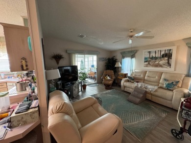 If you are looking for the perfect sanctuary in Central Florida on Lake Henry Golf Club in Florida - for sale on GolfHomes.com, golf home, golf lot