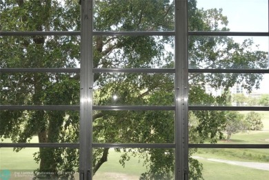 Spacious 2-Bed, 2-Bath Condo with Golf Course Views. Enjoy on Palm-Aire Country Club and Resort - Palms in Florida - for sale on GolfHomes.com, golf home, golf lot
