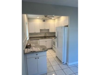 Charming Single-Story Residence with Breathtaking Water Views in on Kings Point Golf - Executive in Florida - for sale on GolfHomes.com, golf home, golf lot