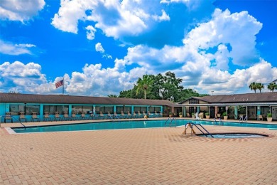 This home is situated in a quiet neighborhood in Sun City Center on Caloosa Greens Executive Golf Course in Florida - for sale on GolfHomes.com, golf home, golf lot