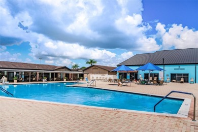 This home is situated in a quiet neighborhood in Sun City Center on Caloosa Greens Executive Golf Course in Florida - for sale on GolfHomes.com, golf home, golf lot