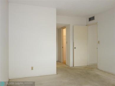 Spacious 2-Bed, 2-Bath Condo with Golf Course Views. Enjoy on Palm-Aire Country Club and Resort - Palms in Florida - for sale on GolfHomes.com, golf home, golf lot