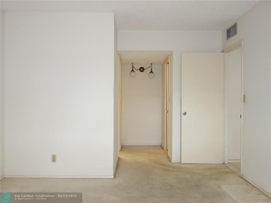 Spacious 2-Bed, 2-Bath Condo with Golf Course Views. Enjoy on Palm-Aire Country Club and Resort - Palms in Florida - for sale on GolfHomes.com, golf home, golf lot