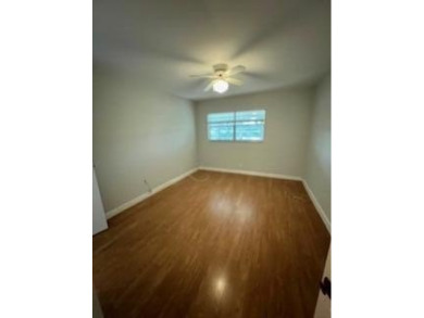 Charming Single-Story Residence with Breathtaking Water Views in on Kings Point Golf - Executive in Florida - for sale on GolfHomes.com, golf home, golf lot