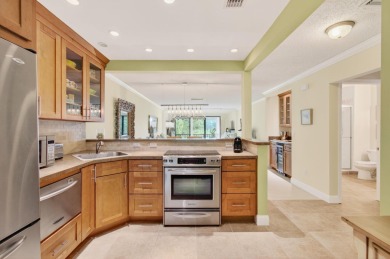 Discover this meticulously kept and beautifully furnished on Boca Lago Golf and Country Club in Florida - for sale on GolfHomes.com, golf home, golf lot