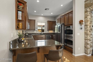 Located in a gated Somersett community, this beautifully on Somersett Country Club in Nevada - for sale on GolfHomes.com, golf home, golf lot