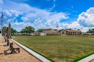 This home is situated in a quiet neighborhood in Sun City Center on Caloosa Greens Executive Golf Course in Florida - for sale on GolfHomes.com, golf home, golf lot