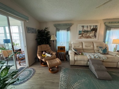 If you are looking for the perfect sanctuary in Central Florida on Lake Henry Golf Club in Florida - for sale on GolfHomes.com, golf home, golf lot