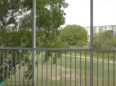 Spacious 2-Bed, 2-Bath Condo with Golf Course Views. Enjoy on Palm-Aire Country Club and Resort - Palms in Florida - for sale on GolfHomes.com, golf home, golf lot