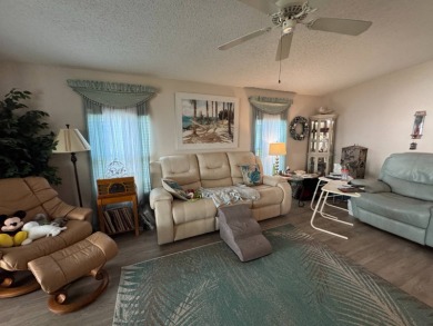 If you are looking for the perfect sanctuary in Central Florida on Lake Henry Golf Club in Florida - for sale on GolfHomes.com, golf home, golf lot