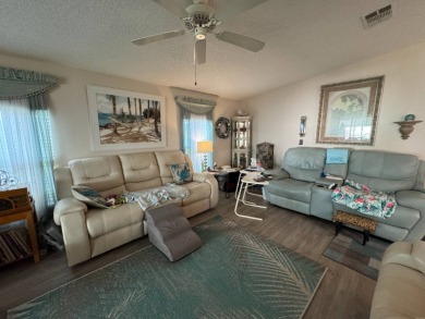 If you are looking for the perfect sanctuary in Central Florida on Lake Henry Golf Club in Florida - for sale on GolfHomes.com, golf home, golf lot