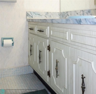 Spacious 2-Bed, 2-Bath Condo with Golf Course Views. Enjoy on Palm-Aire Country Club and Resort - Palms in Florida - for sale on GolfHomes.com, golf home, golf lot
