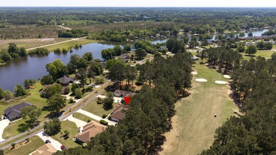 Beautiful custom-built home on the #12 fairway of The Players on Players Course At Wyboo Plantation in South Carolina - for sale on GolfHomes.com, golf home, golf lot