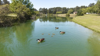 Beautiful custom-built home on the #12 fairway of The Players on Players Course At Wyboo Plantation in South Carolina - for sale on GolfHomes.com, golf home, golf lot