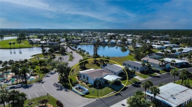 This TRIPLE-wide Palm Harbor home is situated on a spacious on Maple Leaf Golf and Country Club in Florida - for sale on GolfHomes.com, golf home, golf lot