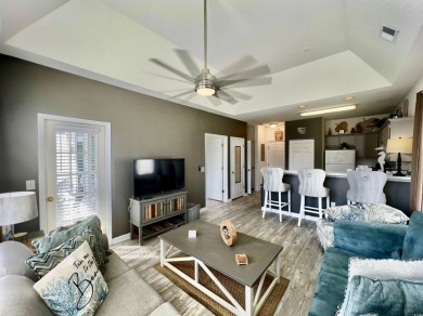 Welcome to this charming top-floor, end-unit condo in The on World Tour Golf Links in South Carolina - for sale on GolfHomes.com, golf home, golf lot