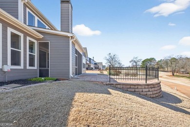 Perfectly positioned along the 18th fairway in the sought-after on Chimney Oaks Golf Club in Georgia - for sale on GolfHomes.com, golf home, golf lot