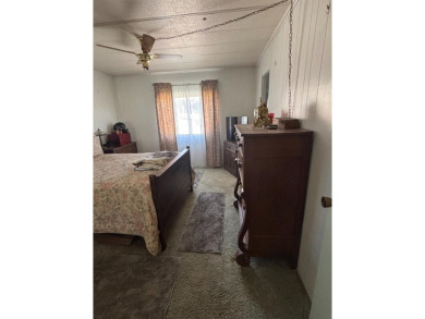 2 bedroom 2 bath mobile home located in the lovely suburban area on Sherwood Forest Golf Club in California - for sale on GolfHomes.com, golf home, golf lot