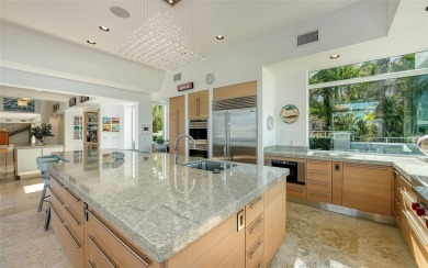 There's so much to love about this exceptional Lido Shores home on Links on Longboat Golf Club in Florida - for sale on GolfHomes.com, golf home, golf lot