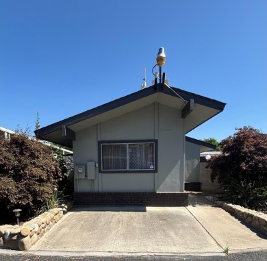 2 bedroom 2 bath mobile home located in the lovely suburban area on Sherwood Forest Golf Club in California - for sale on GolfHomes.com, golf home, golf lot
