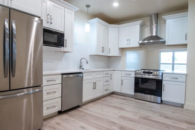 Luxury condominium located on Cooper's Hawk Golf Course on Coopers Hawk in Arkansas - for sale on GolfHomes.com, golf home, golf lot