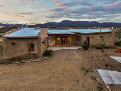 Live inside a work of art in this Artist's Dream Dwelling in on Taos Country Club in New Mexico - for sale on GolfHomes.com, golf home, golf lot