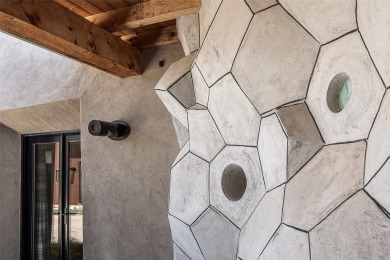 Live inside a work of art in this Artist's Dream Dwelling in on Taos Country Club in New Mexico - for sale on GolfHomes.com, golf home, golf lot