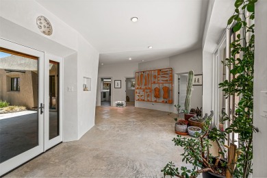 Live inside a work of art in this Artist's Dream Dwelling in on Taos Country Club in New Mexico - for sale on GolfHomes.com, golf home, golf lot