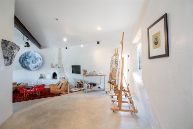 Live inside a work of art in this Artist's Dream Dwelling in on Taos Country Club in New Mexico - for sale on GolfHomes.com, golf home, golf lot