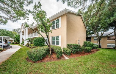Fore!! Your Dunedin dream is within range. Grab your golf cart on The Dunedin Country Club in Florida - for sale on GolfHomes.com, golf home, golf lot