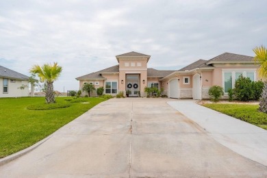 Welcome to your coastal haven! Situated in the South Padre Golf on South Padre Island Golf Club in Texas - for sale on GolfHomes.com, golf home, golf lot