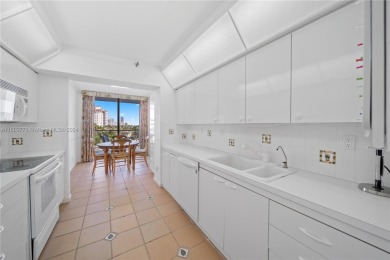 Beautiful corner condo with panoramic water views. Wood floors on Turnberry Isle Resort and Club in Florida - for sale on GolfHomes.com, golf home, golf lot