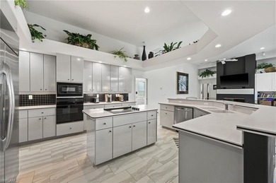 Stunning and immaculately kept, this spacious 3-bedroom plus den on Olde Hickory Golf and Country Club in Florida - for sale on GolfHomes.com, golf home, golf lot