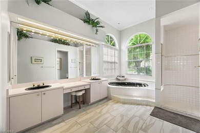 Stunning and immaculately kept, this spacious 3-bedroom plus den on Olde Hickory Golf and Country Club in Florida - for sale on GolfHomes.com, golf home, golf lot