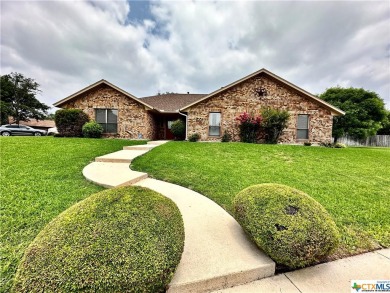 This executive-style custom home located on a large iconic on Hills of Cove Municipal Golf Course in Texas - for sale on GolfHomes.com, golf home, golf lot