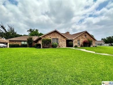 This executive-style custom home located on a large iconic on Hills of Cove Municipal Golf Course in Texas - for sale on GolfHomes.com, golf home, golf lot