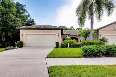 CHARMING VILLA IN VENETIAN FALLS! A VERY UNIQUE SETTING WITH on The Venice Golf and Country Club in Florida - for sale on GolfHomes.com, golf home, golf lot