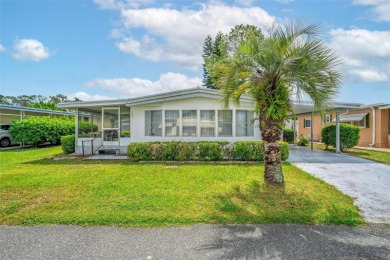 Charming 2-Bedroom Home with Co-op Share in Active 55+ on Lakes at Leesburg Golf Course in Florida - for sale on GolfHomes.com, golf home, golf lot