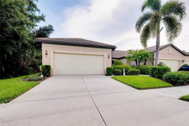 CHARMING VILLA IN VENETIAN FALLS! A VERY UNIQUE SETTING WITH on The Venice Golf and Country Club in Florida - for sale on GolfHomes.com, golf home, golf lot