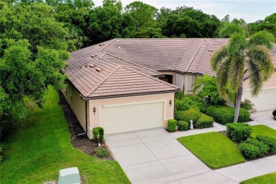 CHARMING VILLA IN VENETIAN FALLS! A VERY UNIQUE SETTING WITH on The Venice Golf and Country Club in Florida - for sale on GolfHomes.com, golf home, golf lot