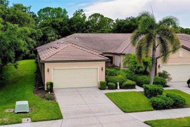 CHARMING VILLA IN VENETIAN FALLS! A VERY UNIQUE SETTING WITH on The Venice Golf and Country Club in Florida - for sale on GolfHomes.com, golf home, golf lot