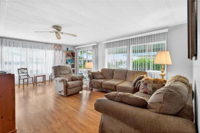Charming 2-Bedroom Home with Co-op Share in Active 55+ on Lakes at Leesburg Golf Course in Florida - for sale on GolfHomes.com, golf home, golf lot