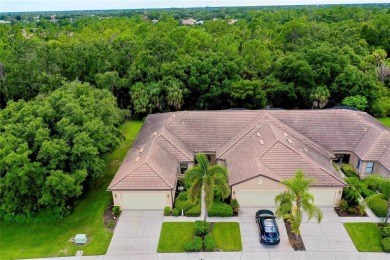 CHARMING VILLA IN VENETIAN FALLS! A VERY UNIQUE SETTING WITH on The Venice Golf and Country Club in Florida - for sale on GolfHomes.com, golf home, golf lot